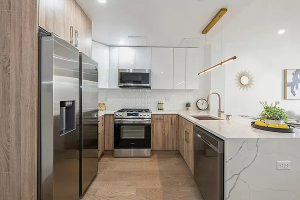 Rented by E Realty International Corp | media 15