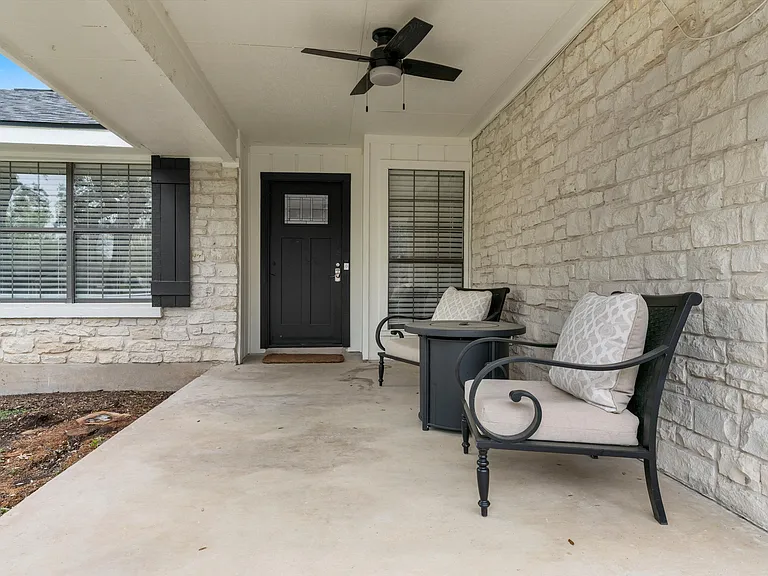 Large Front Porch with Seating and Table
