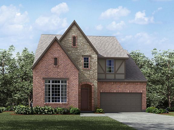 new home with brick and stone