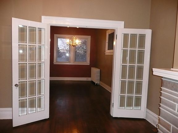 French doors between dinning & living room.
