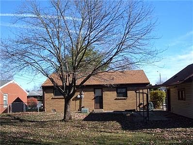 Fully fenced in large back yard with several trees.  Very nice for those smaller children.