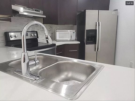 5th image of 9711 Fontainebleau Blvd APT 209D