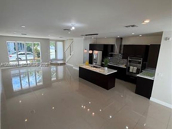 2nd image of 6440 NW 103rd Psge #Townhouse 6440