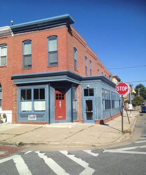 Front of 101 Kenwood Ave with child care center on the first floor.