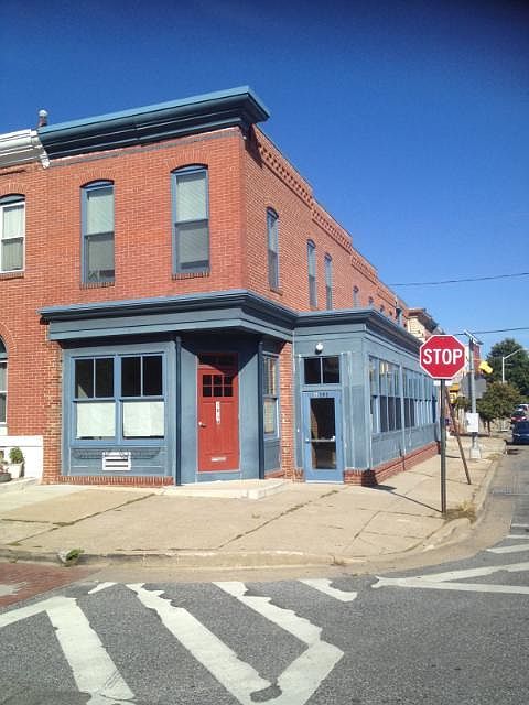 Front of 101 Kenwood Ave with child care center on the first floor.