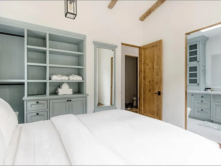 pocket door allows for convenient access from master suite to its ensuite full bath
