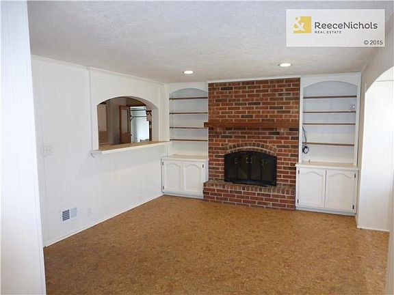 Family Room with Fireplace, Built Ins, Kitchen Breakfast Bar
