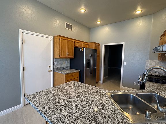 4th image of 10026 Yellow Canary Ave