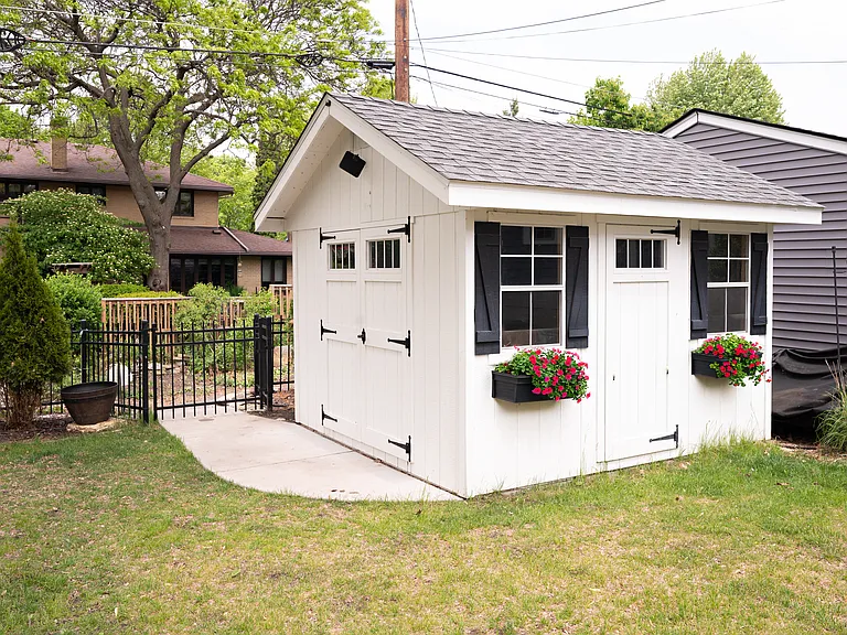 Storage shed holds all your yard equipment, bikes, garage overflow and more.