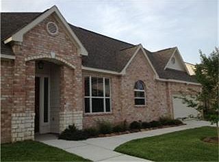 2 car over sized garage with quiet automatic garage door opener