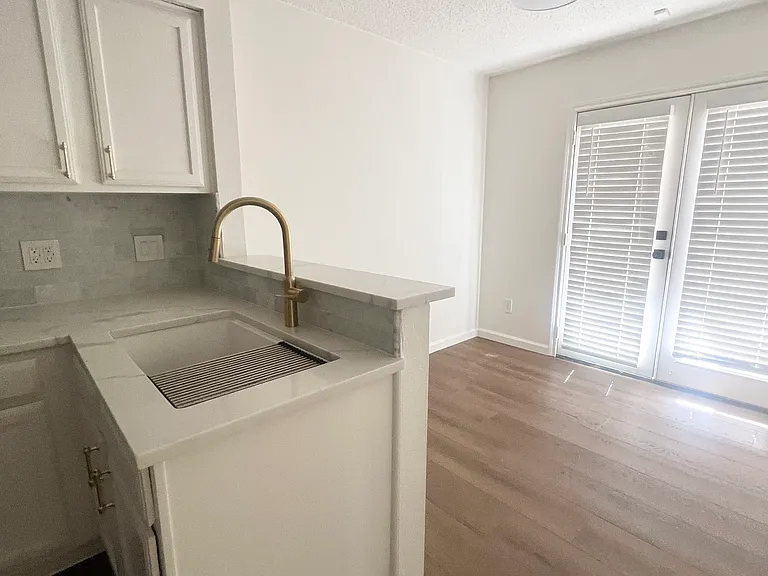 Kitchen, and flexible dining or office space. French doors that lead to patio