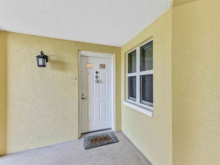 611 Riviera Dunes Way #304 — Photo 3