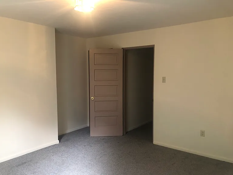 Master bedroom. New carpeting and new vinyl plank flooring throughout the unit.