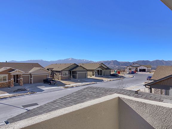 The balcony located off the master suite offers Pikes Peak and Front Range mountain views.