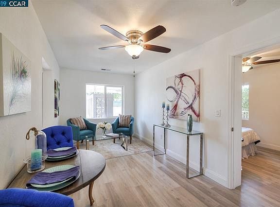 Living space with ceiling fan.