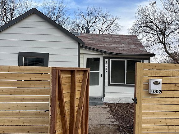 Main entrance thru brand new gated fence