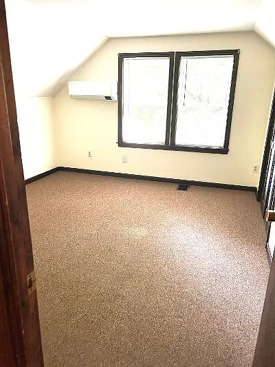 Second floor bedroom on left, mini split, closet.