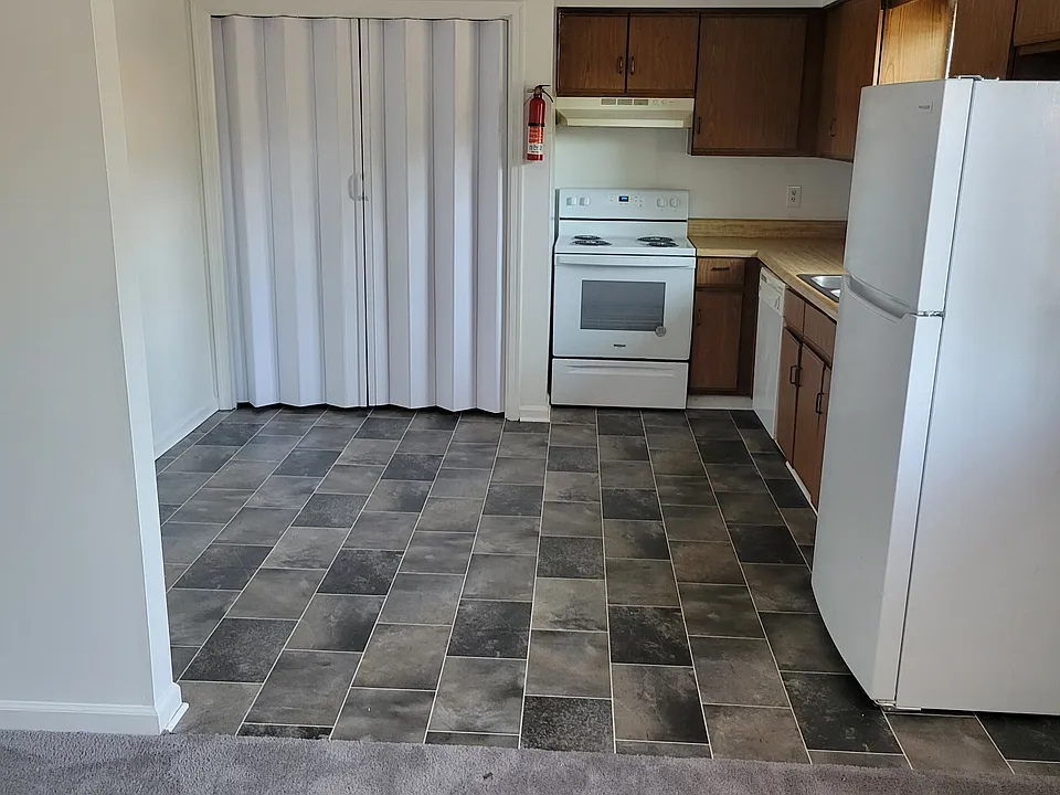 Open living room leading to kitchen