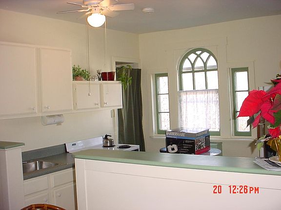 Fully-equipped kitchen & serving bar. Entrance far right.