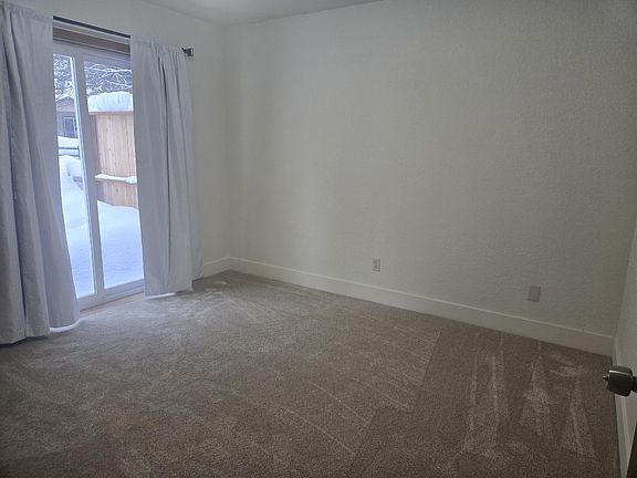 Master Bedroom with Deck to backyard.