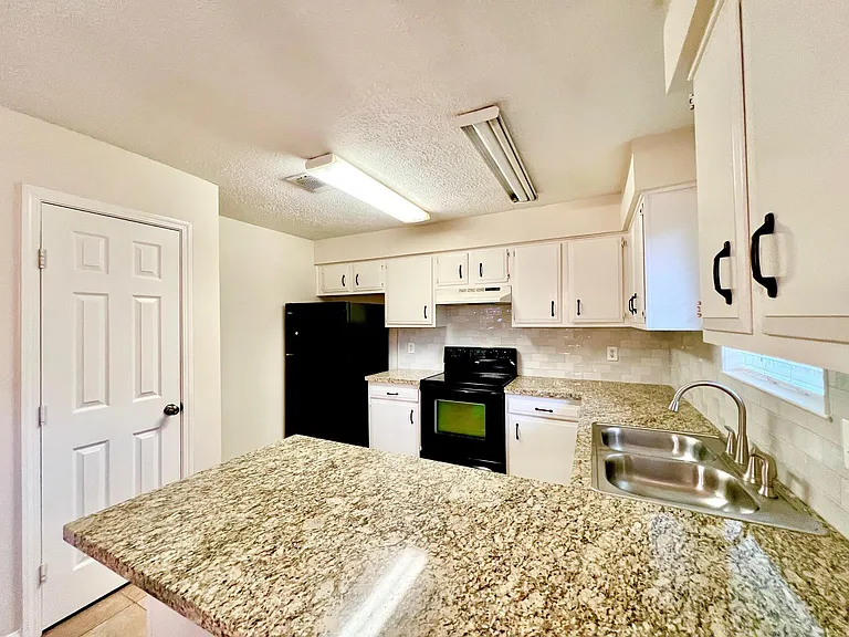 The refrigerator stays with the home.