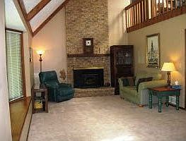 cozy fireplace with wood burner