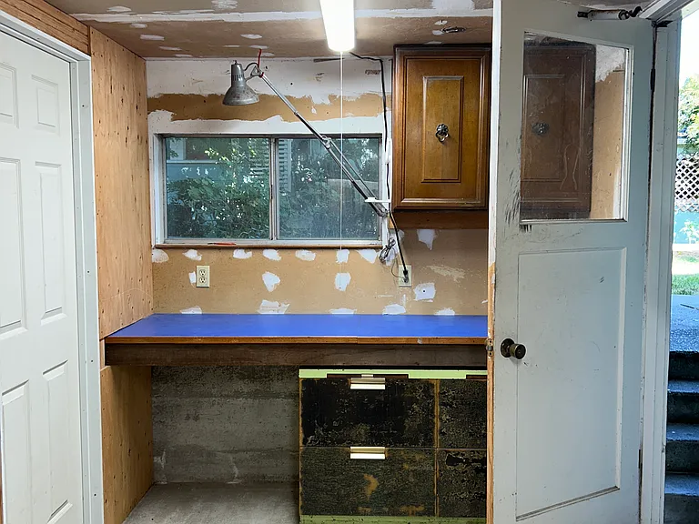 Garage storage and entry to laundry area.