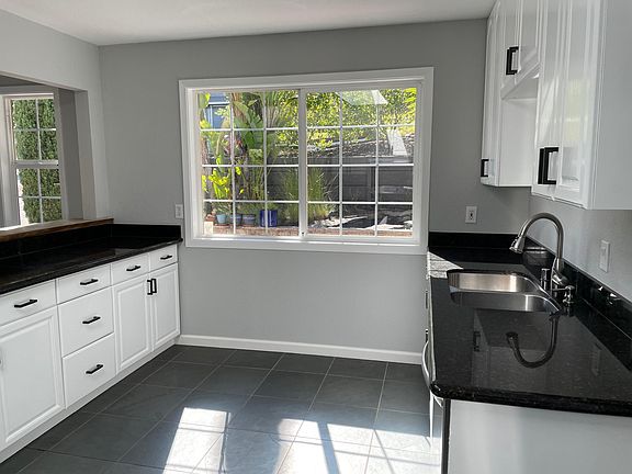 Kitchen looking out to front pond