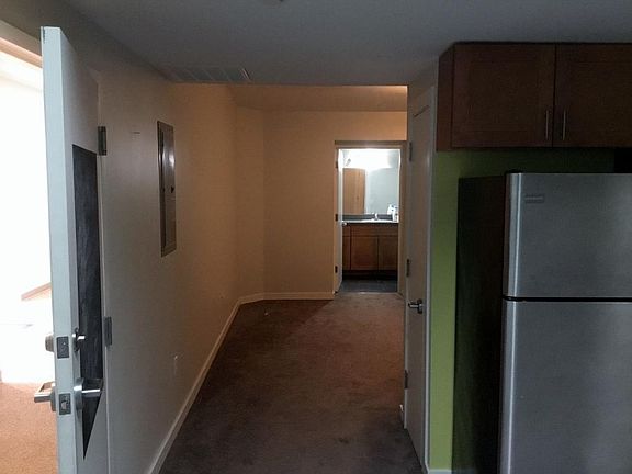 Hall into bedroom and bathroom