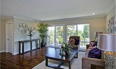 Large walk-in closet/storage space creates an entry and could ev