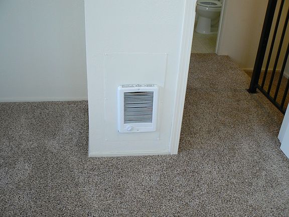 Individual wall heater with fan