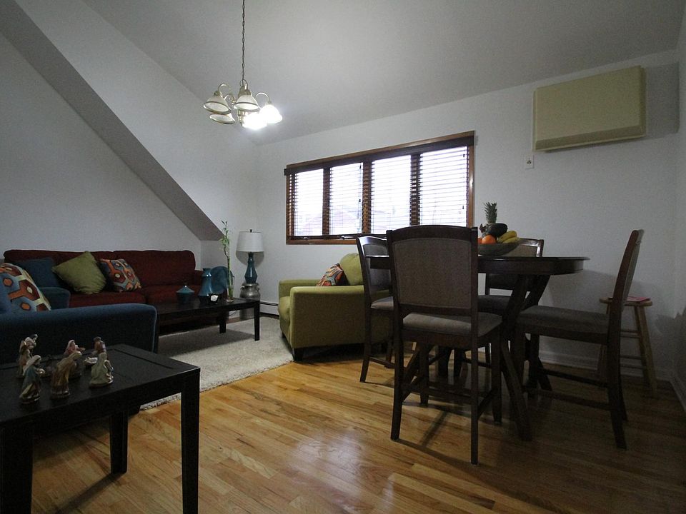 Spacious Living Room with vaulted ~12' ceilings.