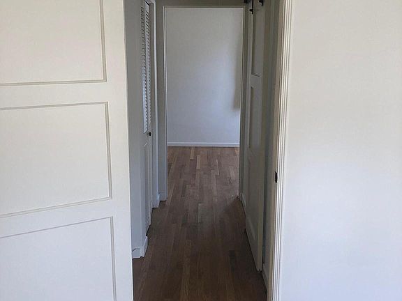 Hallway, leading to bedrooms and bathroom