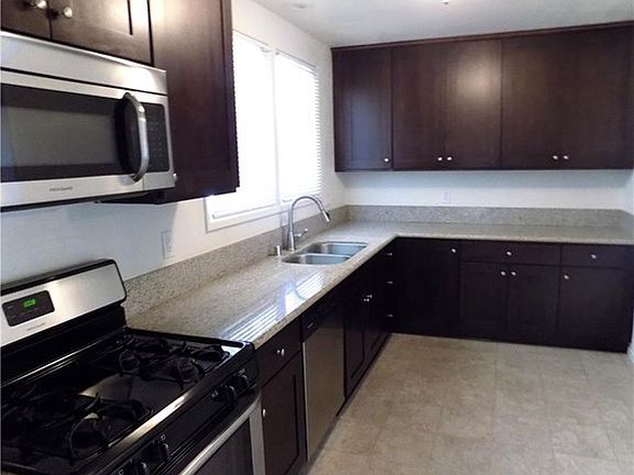 The kitchen was remodeled just a year ago. New cabinets, granite counters,sink, and appliances were installed.