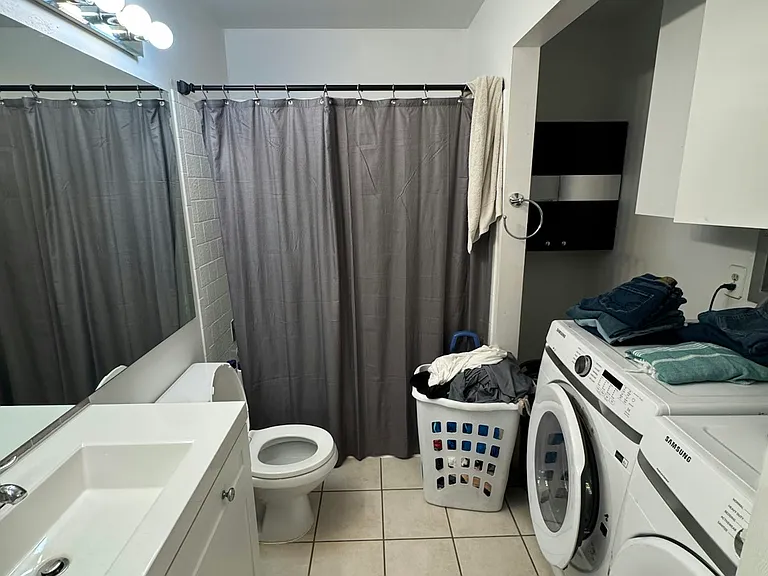 Upstairs shared bath and laundry