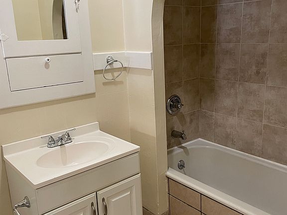 Bathroom with tub and shower