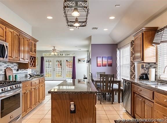 5th image of 13609 E 90th Ct N