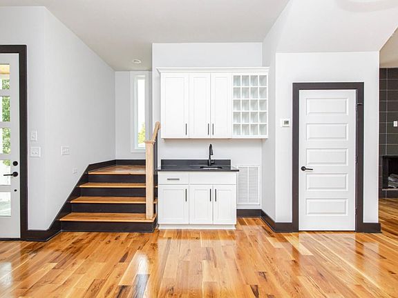 Lower level wet bar and wine rack.