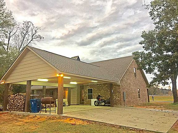 Lg Carport w/storage abov