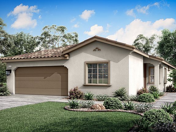 A single-story house with a tiled roof, surrounded by lush greenery and a clear blue sky with fluffy