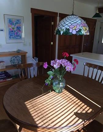 Dining room table seats four.