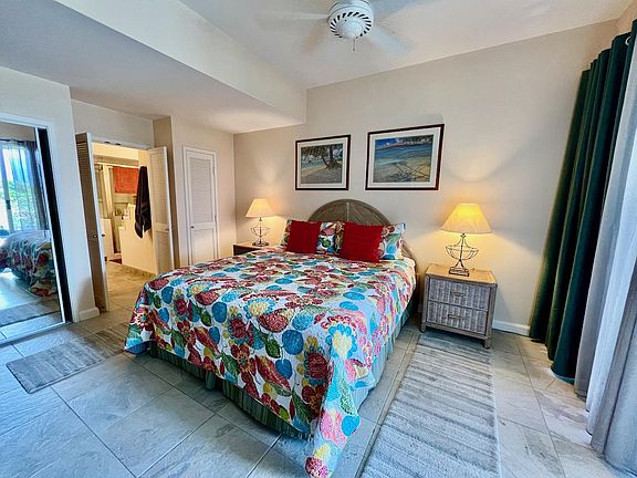 MATER BEDROOM WITH KING BED AND ENSUITE BATHROOM AND MOUNTAIN VIEWS FROM SECOND FLOOR, PRIVATE, END UNIT