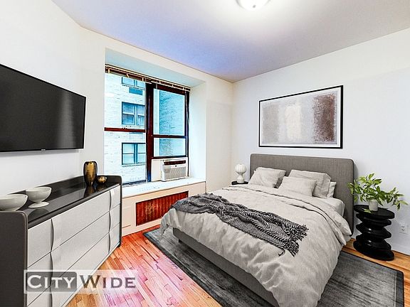 2nd image of 117 W 58th St APT 12E