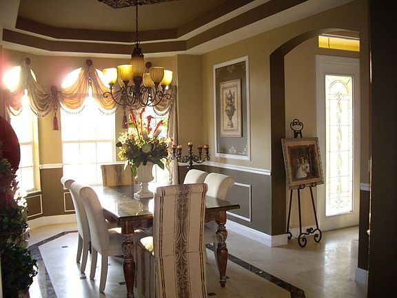 Dining Room with Marble Inlayed Flooring