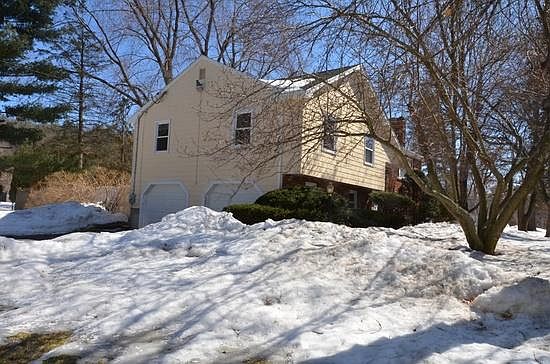 2-car garage with front view of the house