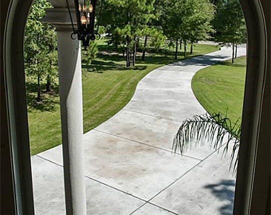 Set far back from the street this home feels tucked away into the big trees.
