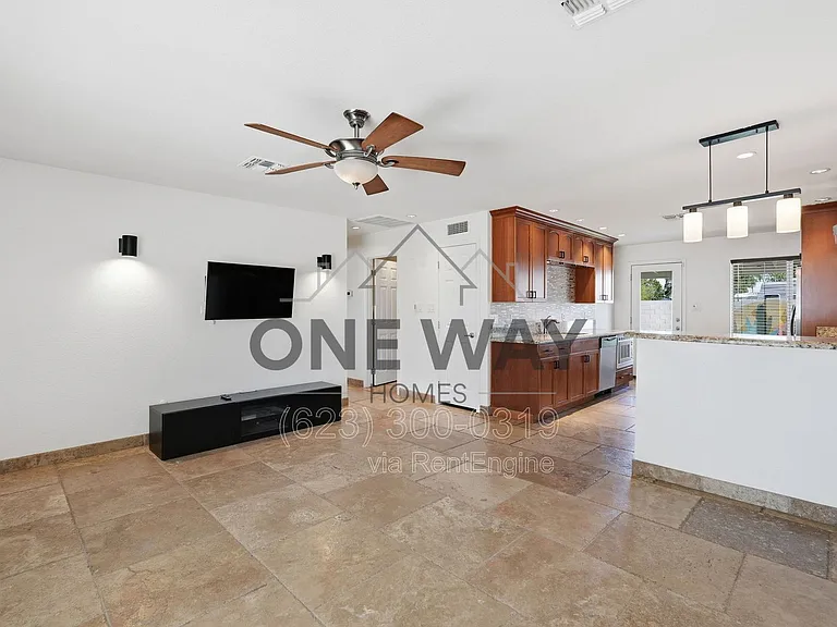 8702 E Sheridan St — Photo 6