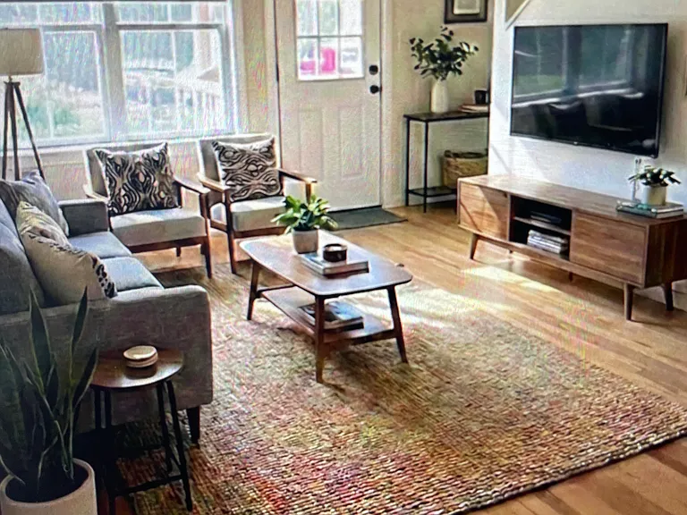 Living area virtually staged with lots of natural light