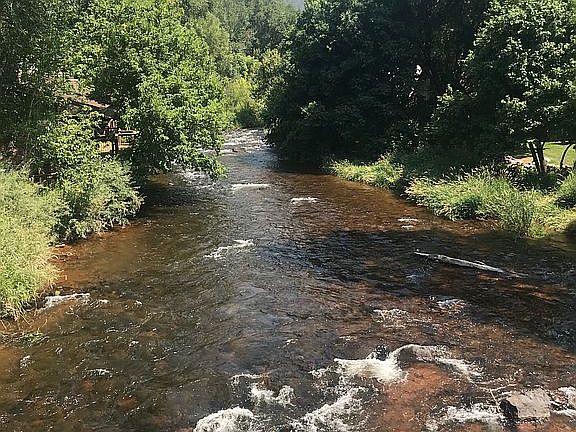 River behind condo