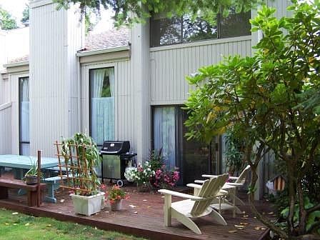 Private back deck w/ slider to formal dining area